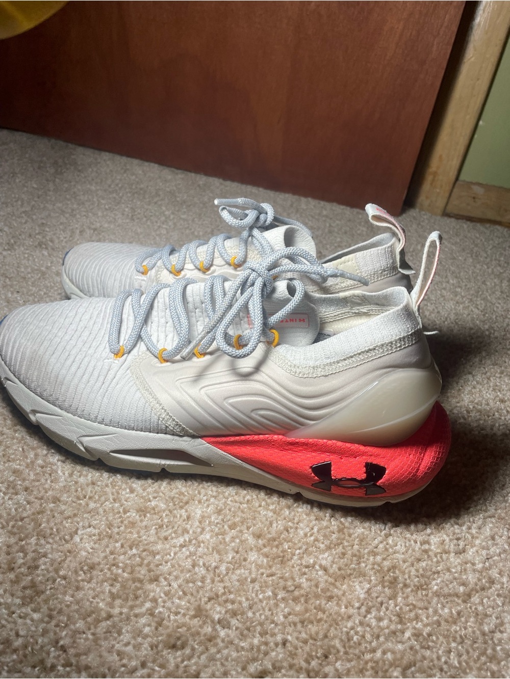 Under Armour Women's White Athletic Sneakers with Coral Heel Accent